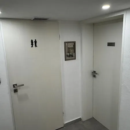 Gemuetliches Kellerzimmer + Bad Séjour chez l'habitant